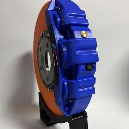 Blue brake disc lamp with glowing LED light for car enthusiasts décor