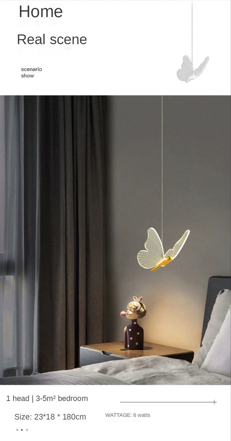 Butterfly-shaped pendant light in a bedroom setting with a gray wall and bed.
