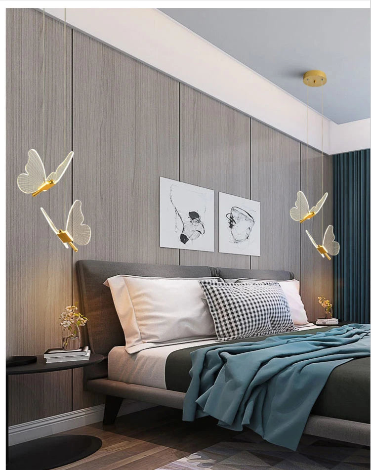 Modern bedroom interior with a bed, wall art, and decorative lighting.